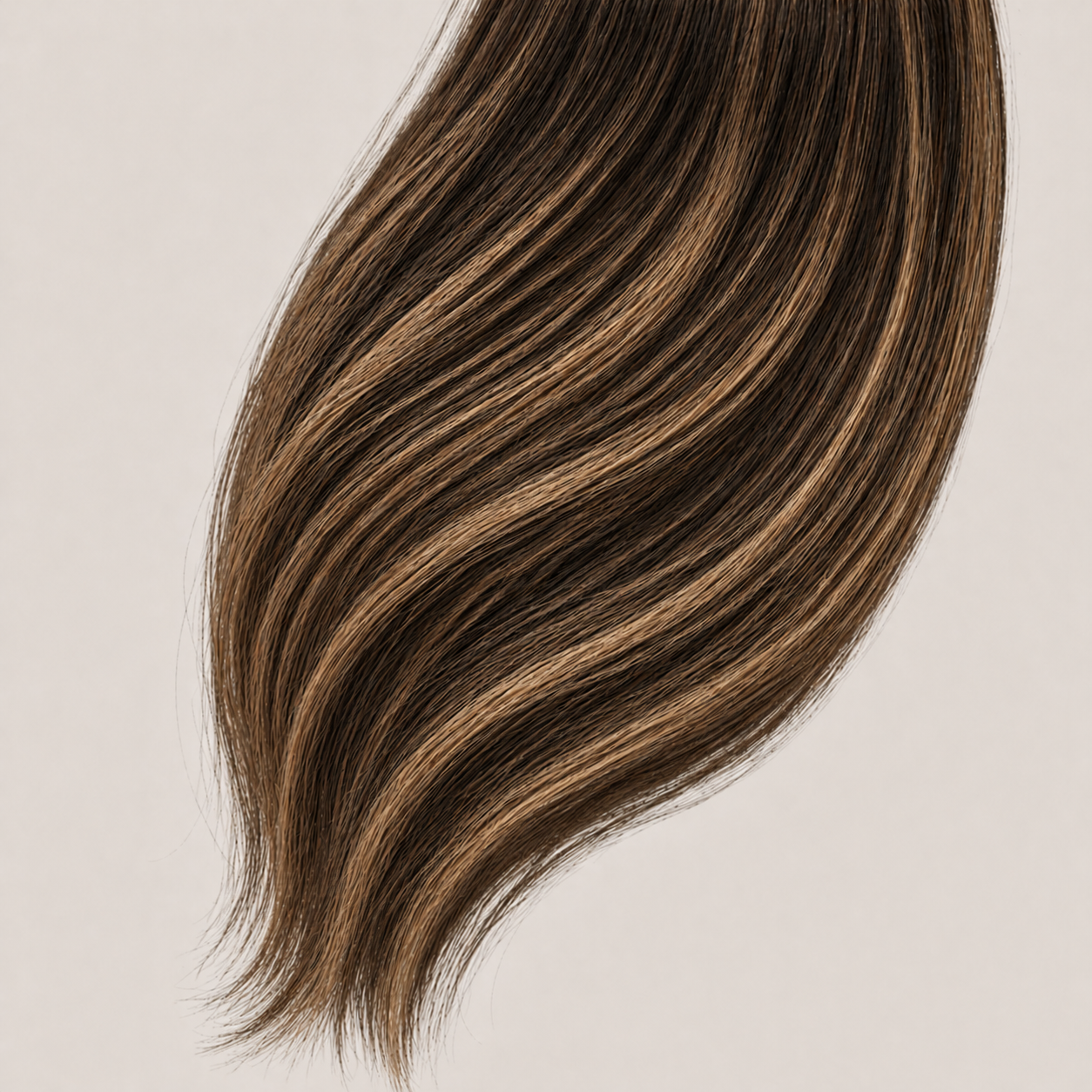 Stessia butterfly weft hair extensions in shade #3/3T24 Balayage, laid flat
