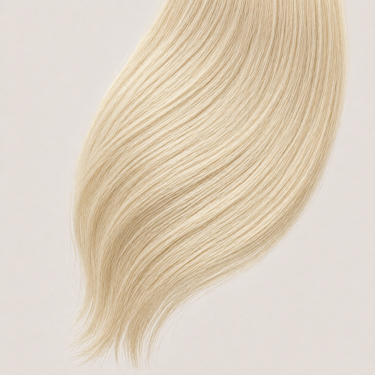 Stessia butterfly weft hair extensions in shade #613 Vanilla Blonde, laid flat