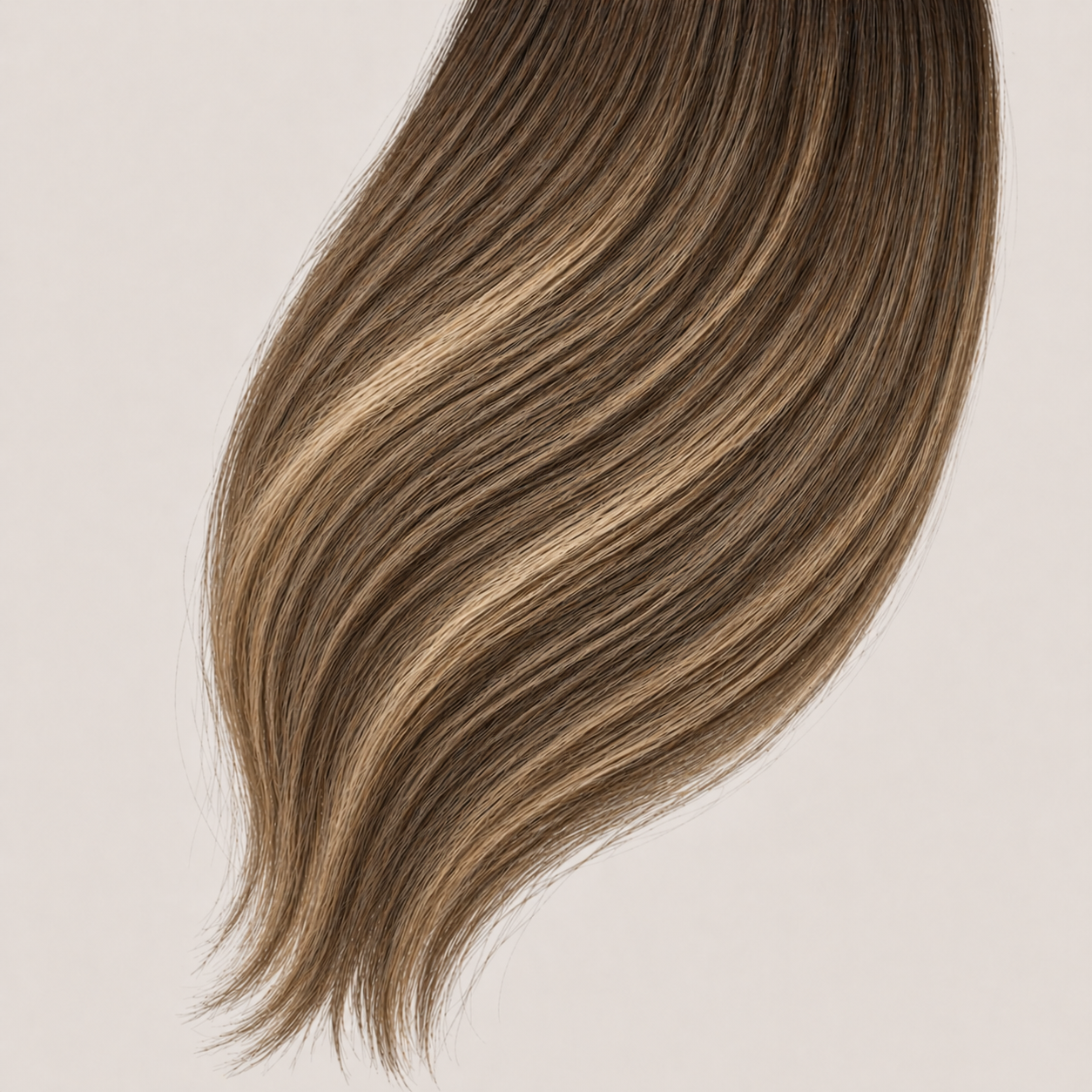 Stessia butterfly weft hair extensions in shade #6/6T24 Balayage, laid flat