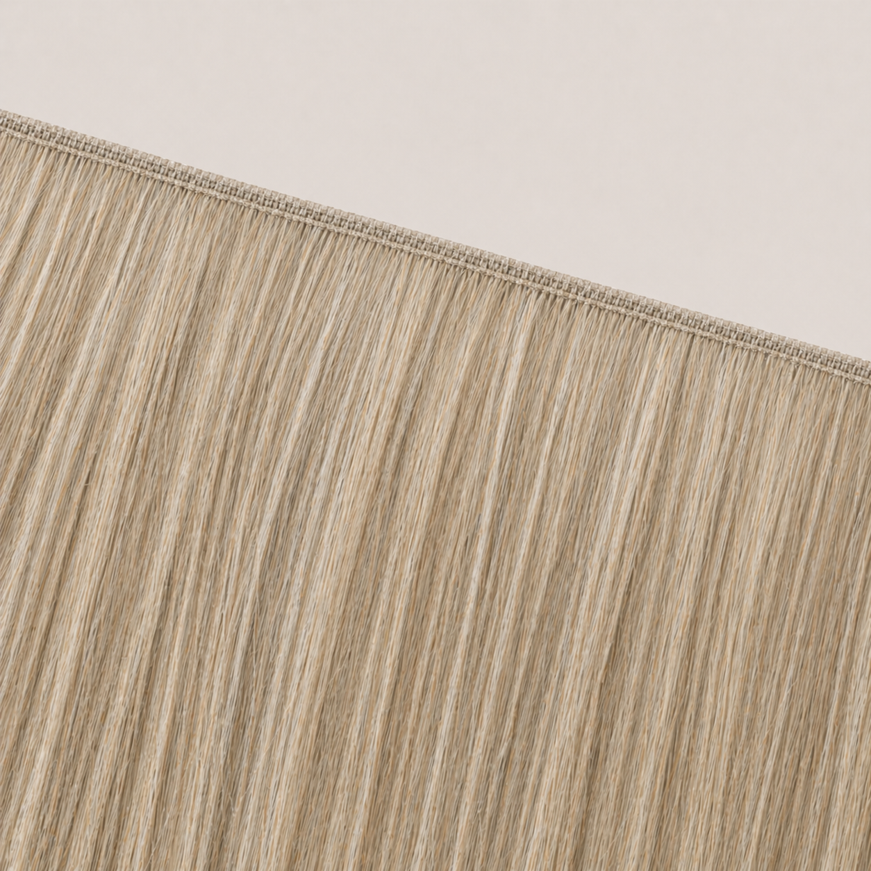 Flat butterfly weft seam of Stessia hair extensions in shade #M18/613 Highlights