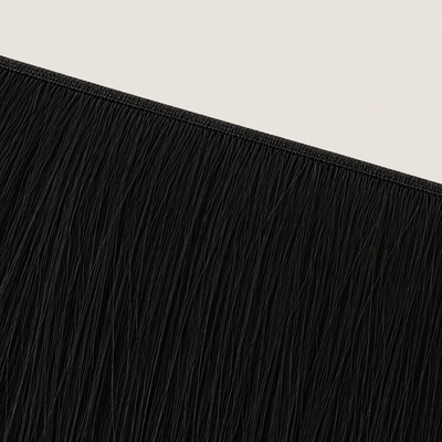 Flat butterfly weft seam of Stessia hair extensions in shade #1B Brown Black