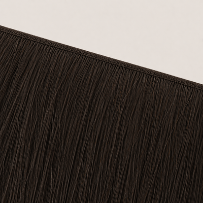 Flat butterfly weft seam of Stessia hair extensions in shade #2 Black Brown