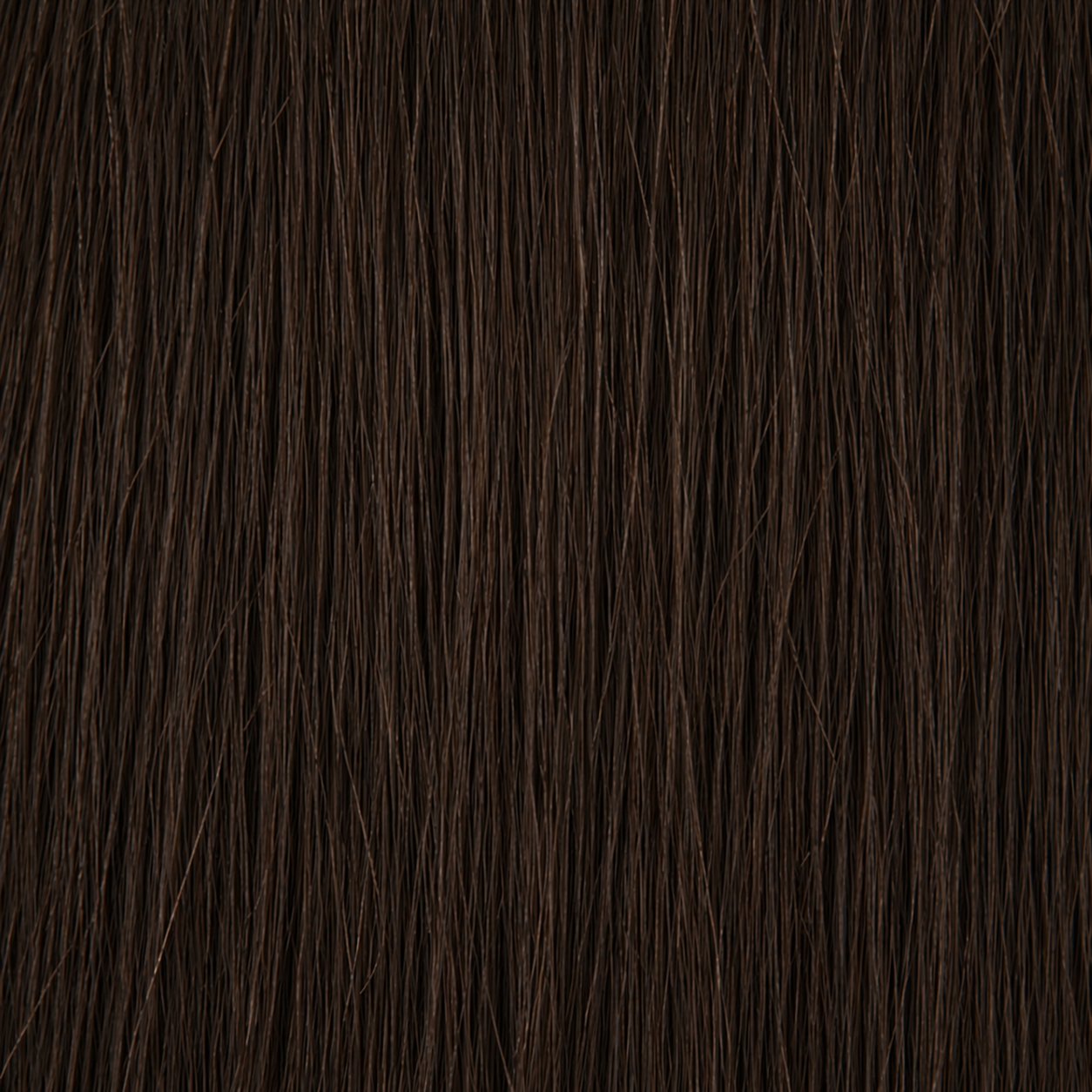 Close-up of the Remy human hair texture in shade #2 Black Brown