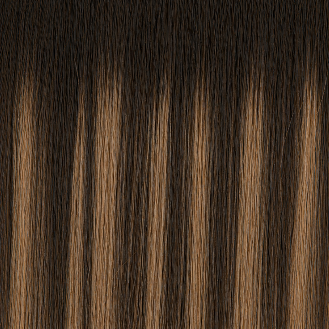 Close-up of the Remy human hair texture in shade #3T8/613 Balayage