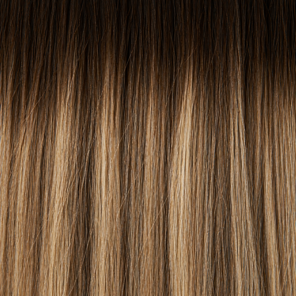 Close-up of the Remy human hair texture in shade #4/8/18 Balayage