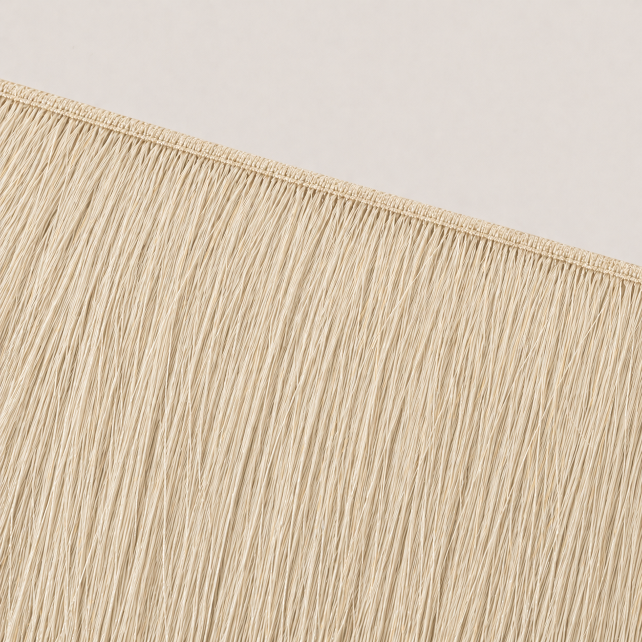 Flat butterfly weft seam of Stessia hair extensions in shade #613 Vanilla Blonde