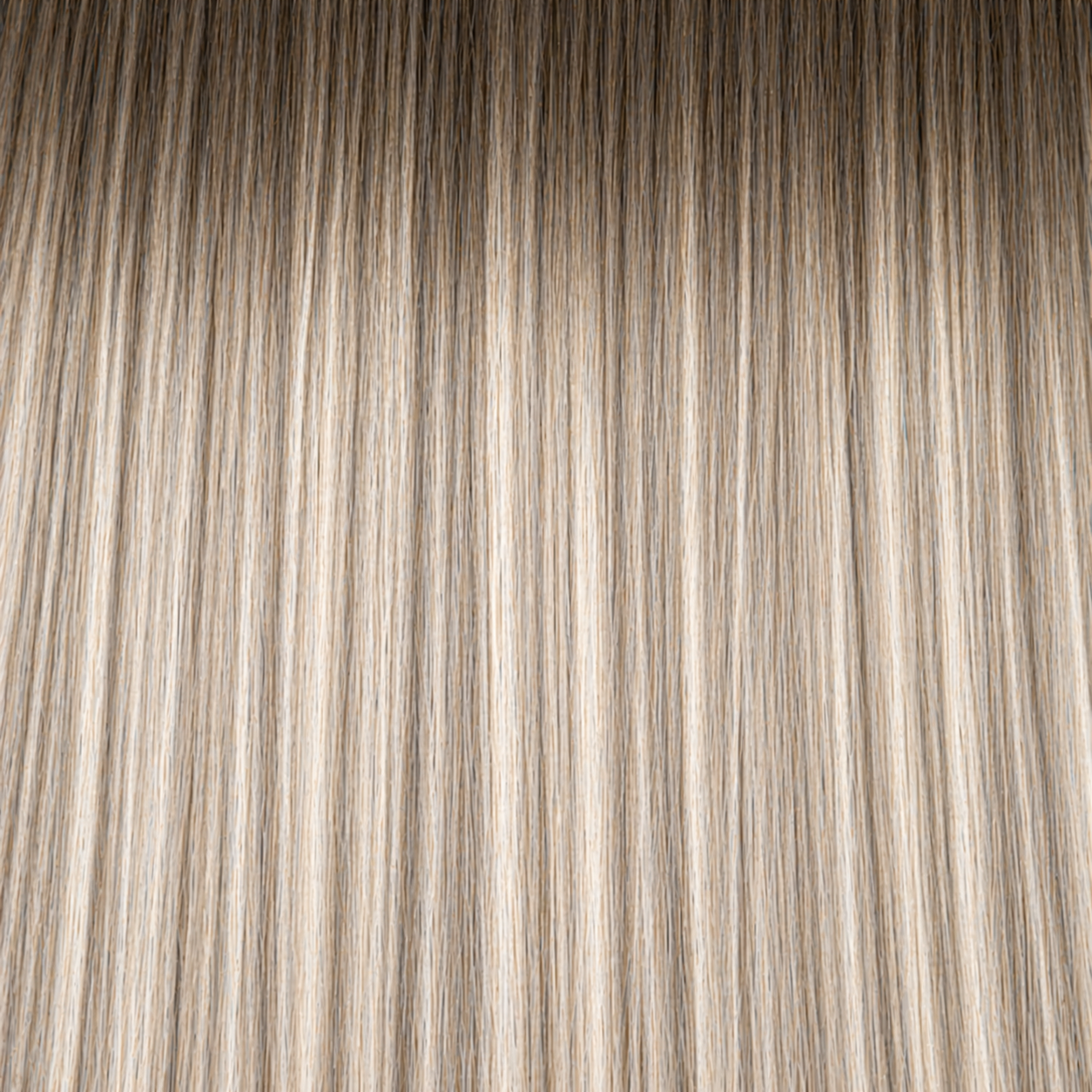 Close-up of the Remy human hair texture in shade #7A/613/18A Balayage