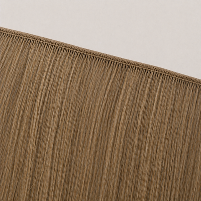 Flat butterfly weft seam of Stessia hair extensions in shade #8 Medium Blonde